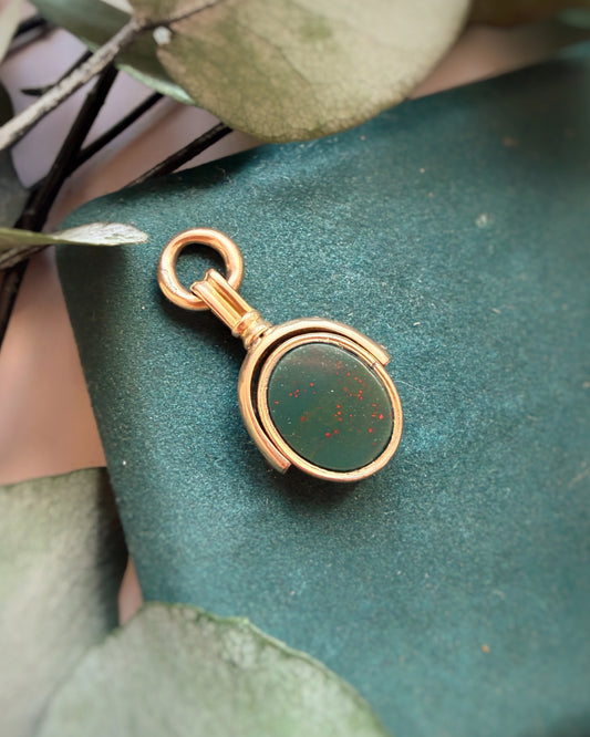 Antique Delicious Oval Spinner Fob