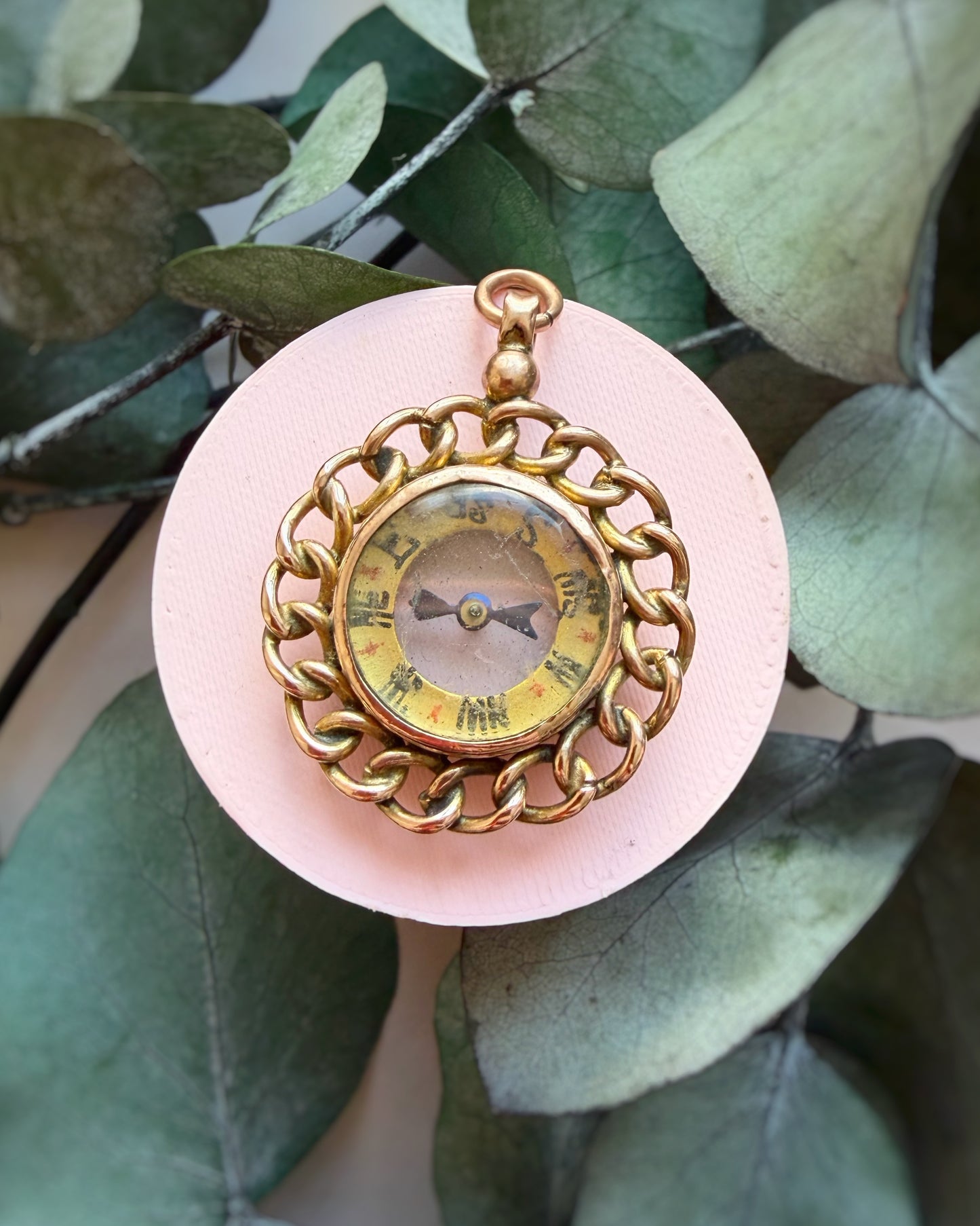 Antique Curb-Bordered Compass Charm